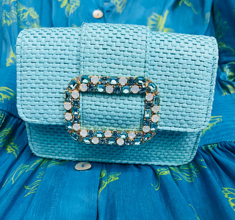 Clutch bag in royal aquamarine raffia