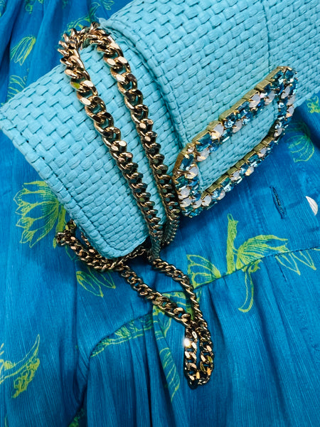 Clutch bag in royal aquamarine raffia