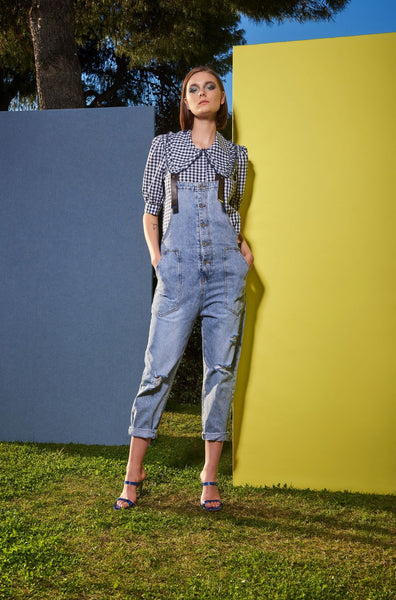 JEAN JUMPSUIT WITH FAUXLEATHER BRACES AND UTILITY POCKETS